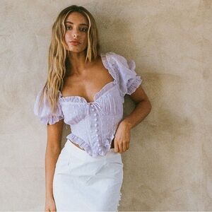 Sabo Skirt Lavender Embroidered Corset Top

-Neila Puff Top
